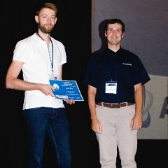 Anton Hasse accepts Poster Award from Andrei Benediktovitch (ATOMICUS)  07 Thursday 8th - Lectures